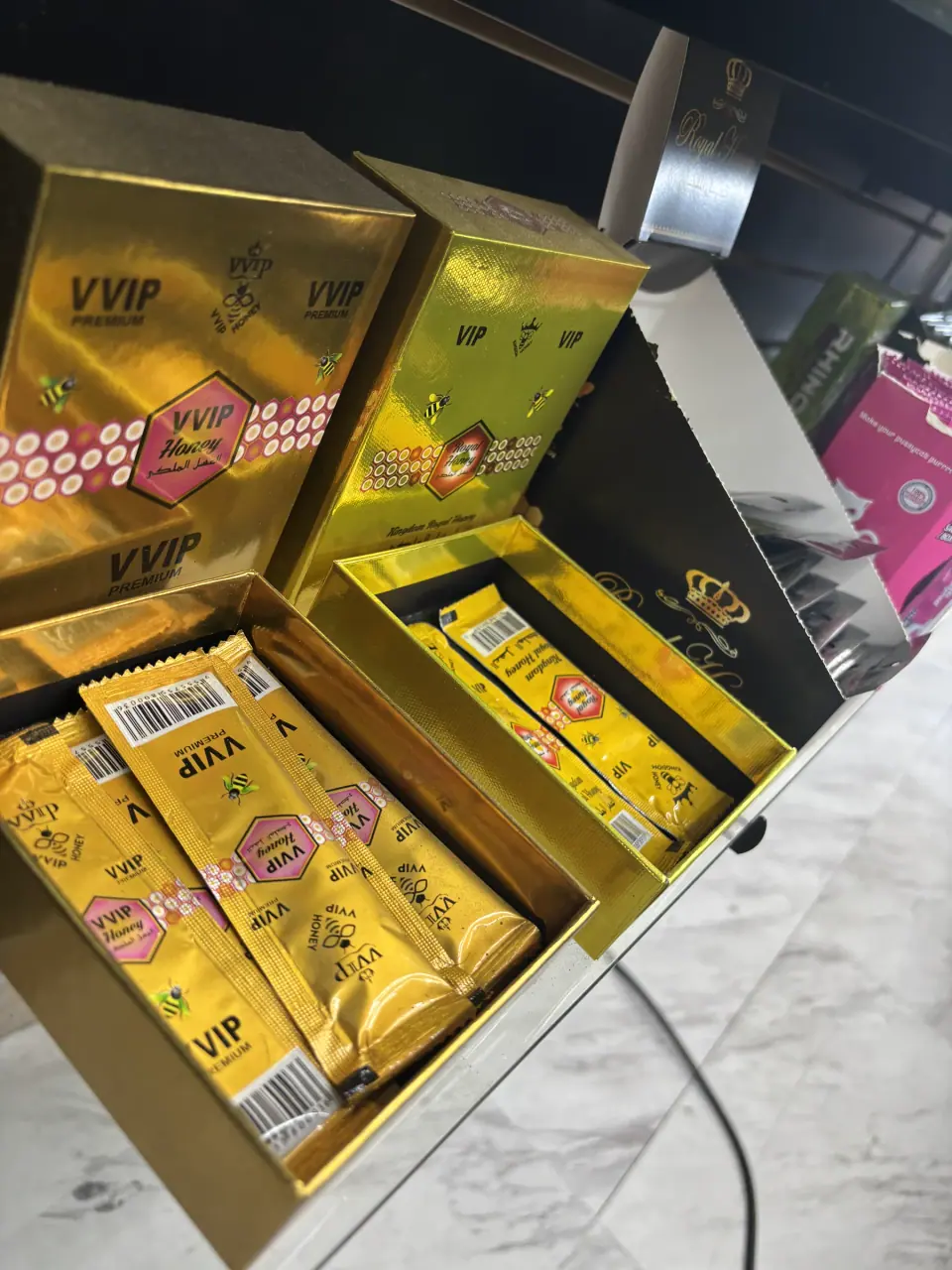 Boxed honey packets displayed at Imperial Beach Smoke and Market