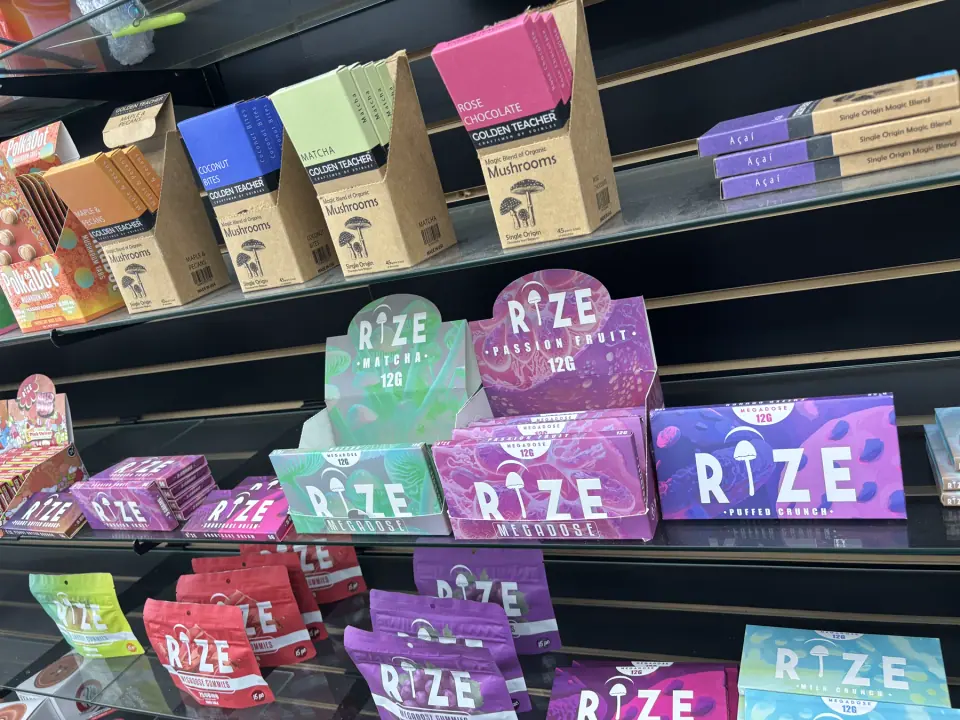 Close-up of assorted mushroom chocolate bars on store shelves