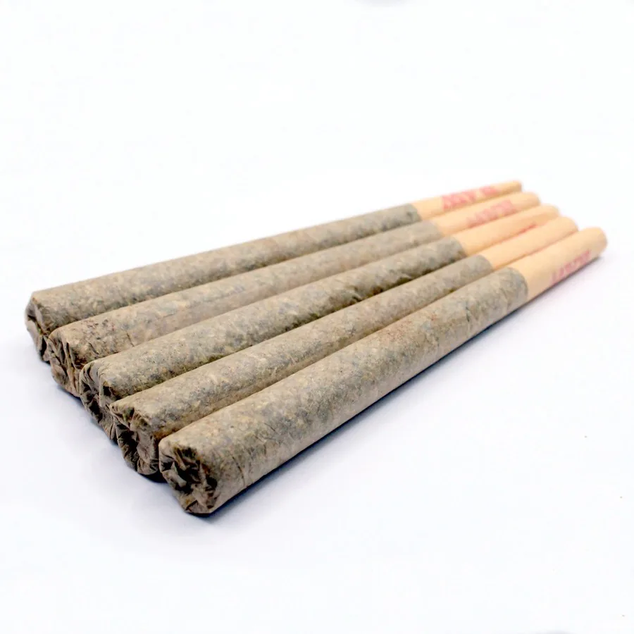 Prepared pre rolls arranged on a clean white background