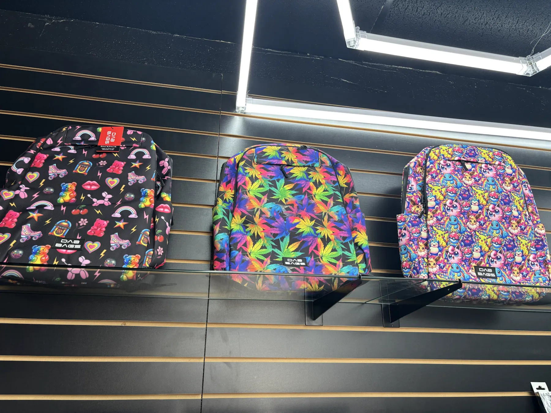 Colorful backpacks and crossbody bags displayed in the shop